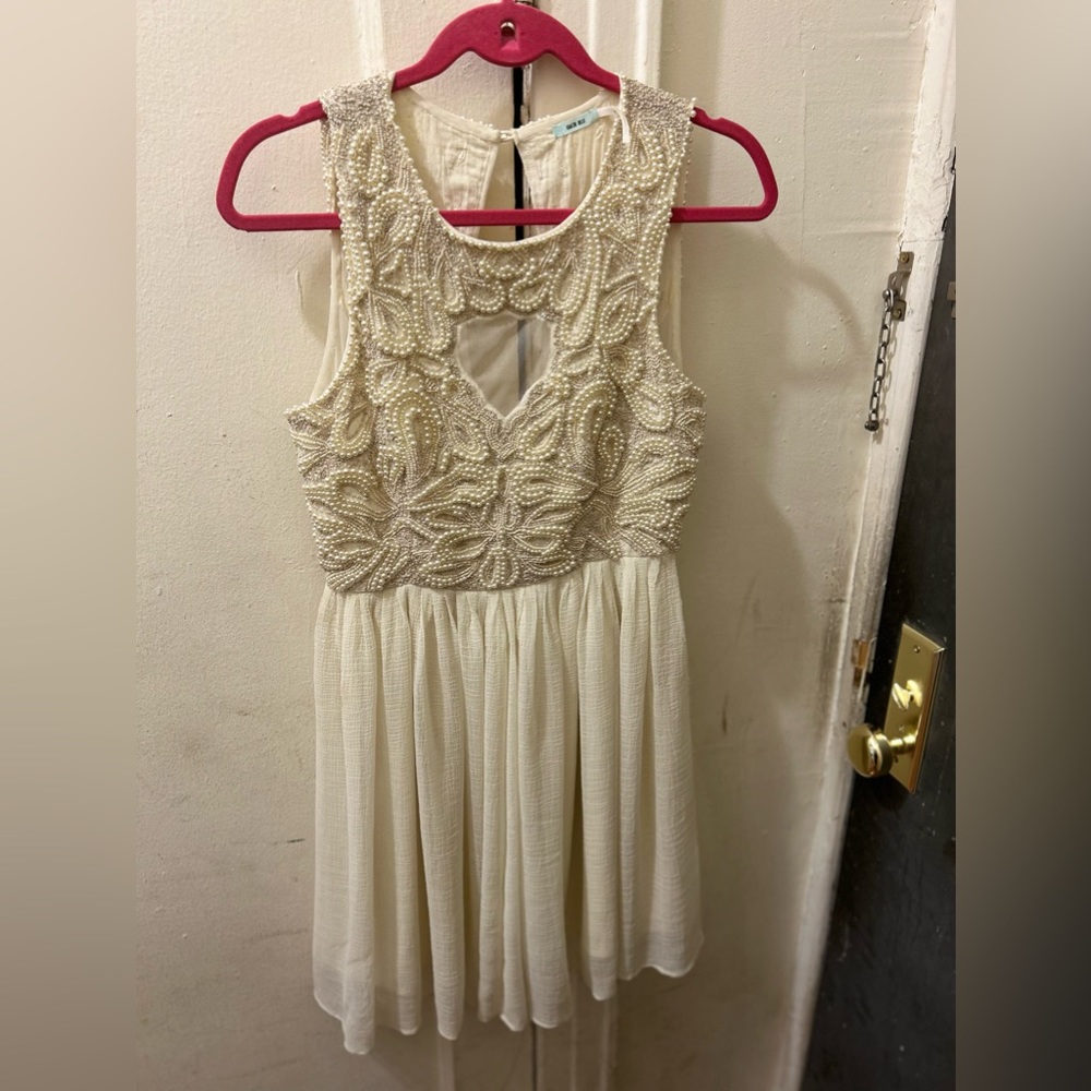 Brand new beaded cream dress in size 6